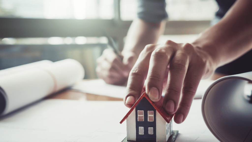 a man signing in a real estate contract