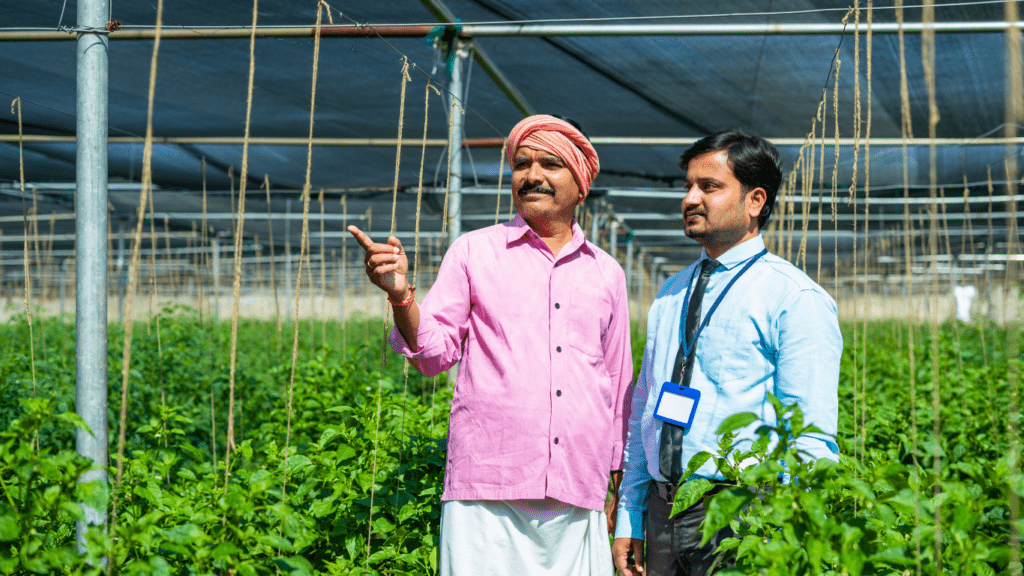 two people having a discussion in a farm