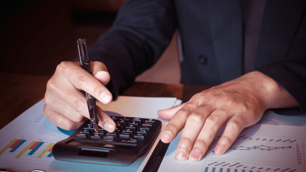 a man using a calculator